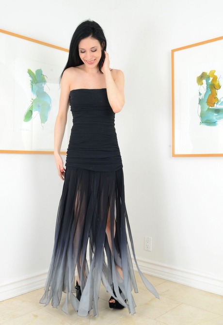 Dark haired temptress Aiden spreads her honeypot in heels