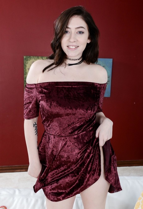 Black haired Amilia strips to show off her pale nude body - 2 of 16