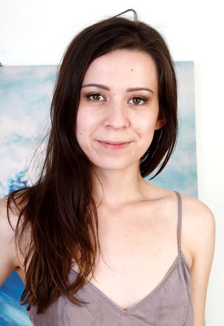 Teen Ariel shares her tiny tits and bald pussy in her room - 2 of 16