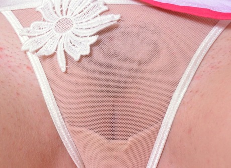 Dream girl Ella lifts her skirt to tease in see thru panties - 6 of 16