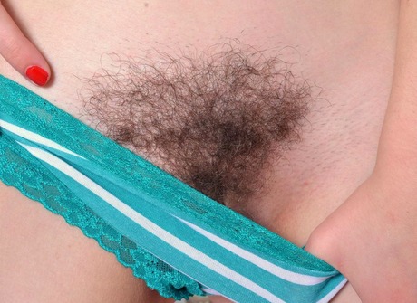 Ember stripteases in her bedroom to show her natural pussy - 5 of 16