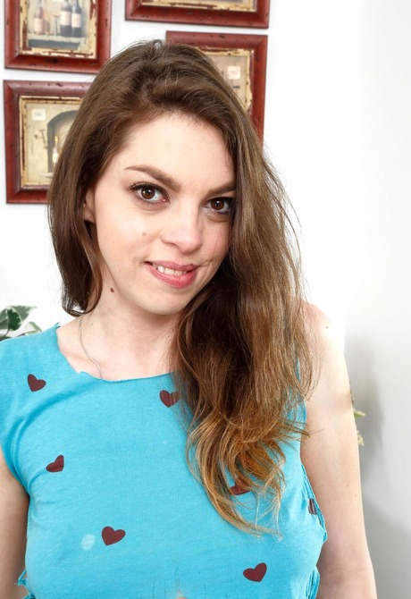 Brunette teen Hailey takes off her jean shorts and teases