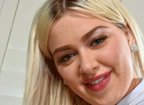 Naughty schoolgirl Heidi Hampton lifts her skirt to tease - 4 of 16