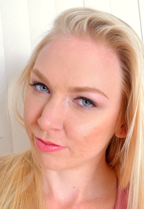 Blue eyed blonde Kara takes off her little dress and teases