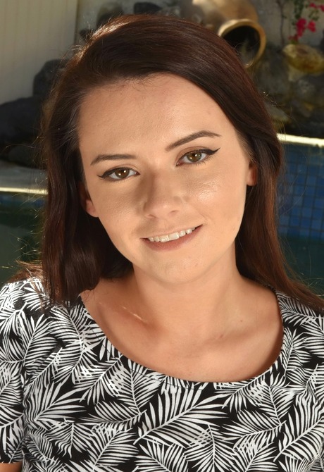 Curvy brunette Karli strips naked and poses naughty outdoors - 2 of 16