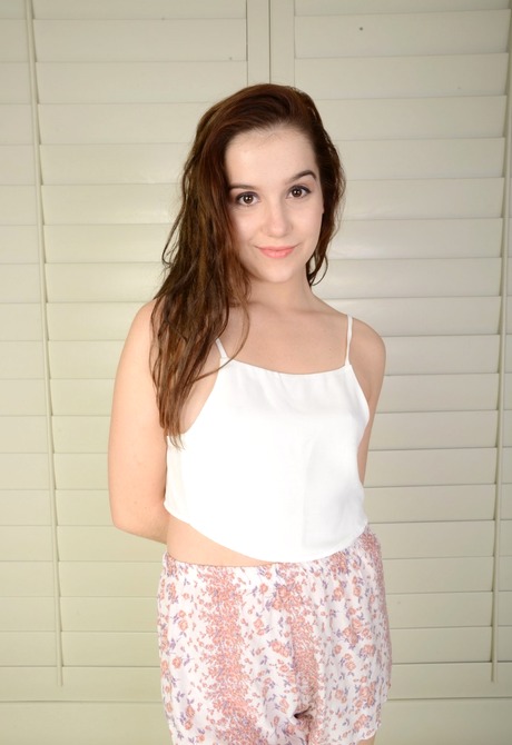 Teen Kasey takes off her clothes and pulls her pussy open