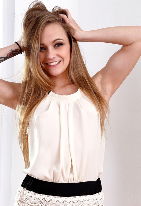 Beautiful coed Keegan shows off her pierced tits and tattoos - 3 of 16