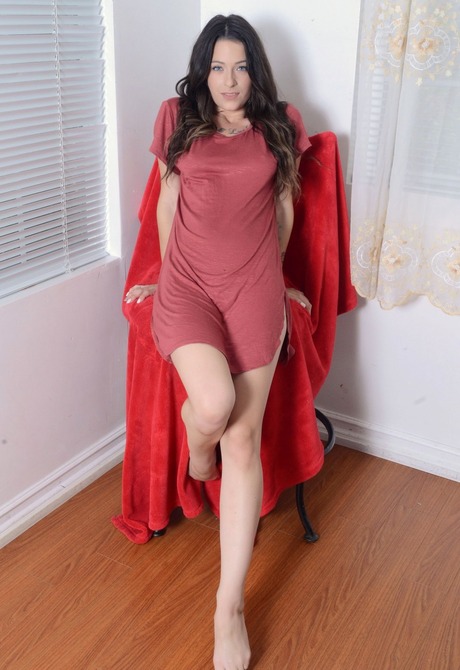Sensual brunette Lacey lets you see her smooth shaved pussy