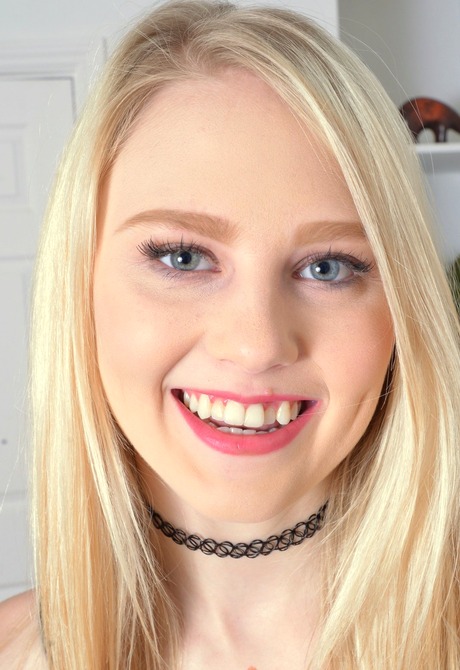 Lovely blonde Lily Rader stripteases out of her lingerie