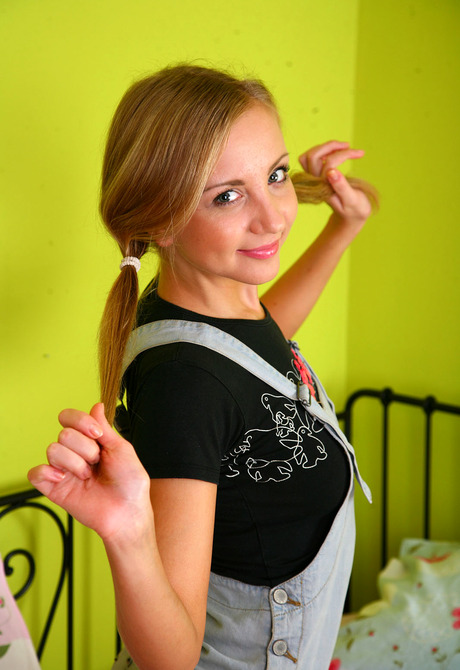 Flirty blonde coed Lory plays with her pussy in her bedroom - 4 of 15