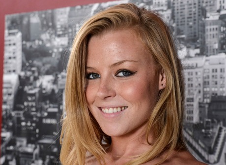 Beautiful tan Nicole lifts up her dress and fingers her ass - 3 of 16