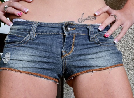 Busty girl next door Olivia Blu stripping off jean shorts - 8 of 16