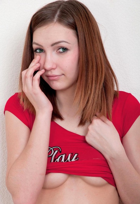 Teen temptress Sabrina strips off her skirt in tall boots - 8 of 15