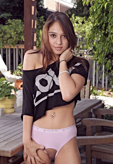 Sweet little Sara shares her naughty side and spreads pink - 4 of 16