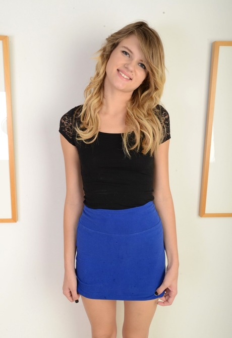 Flirty teen Scarlett pulls off her skirt to toy her pussy