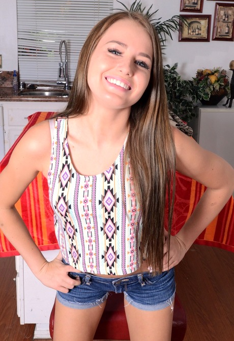 Playful teen Scarlett strips naked and spreads her pink twat