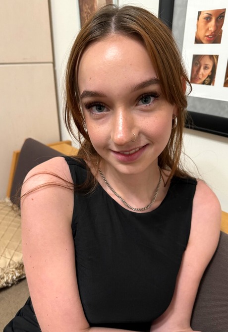 Tattooed teen gives a closeup of her pussy during her striptease session - 4 of 16