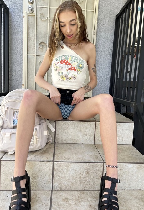 Breezy Bri loves getting naked flauting her thin figure and pink pussy - 4 of 16