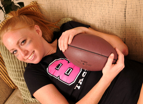 Coed teen Ami teasing with football and spreading - 1 of 16