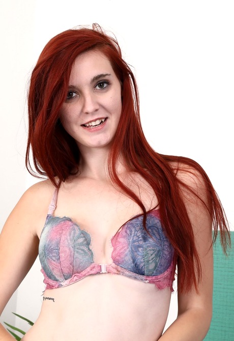 Redhead teen Pyper strips naked and spreads in her bedroom - 4 of 16