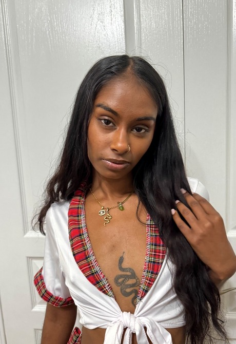 Exotic teen Fae Love teasing in schoolgirl outfit and spreading pink pussy - 2 of 16