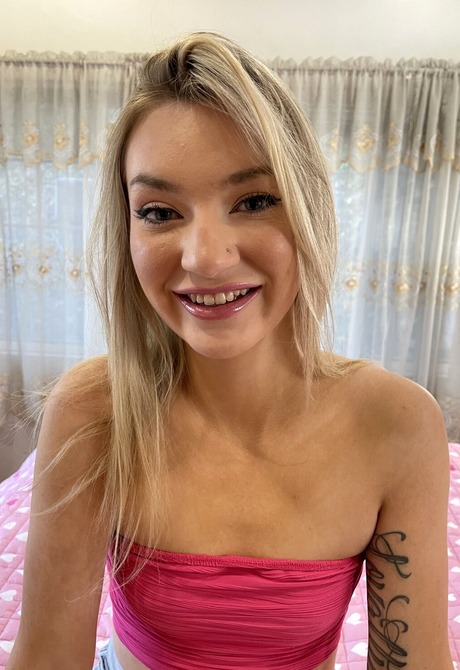 Petite horny teen Daisy Lavoy spreading juicy ass on bed - 3 of 16