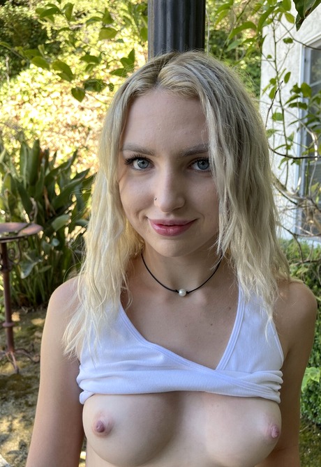 Cute blonde teen Britt Blair getting naked and spreading pussy outdoors - 5 of 16