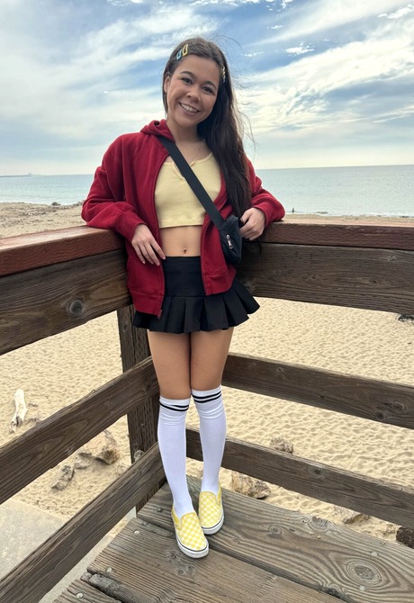 Cute Asian Brianna Arson wears knee socks outdoors in public and flashes pussy at beach - 4 of 16