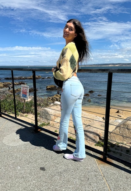 Cute teen brunette Aubry Babcock reveals hairy pussy during sexy feet teasing - 3 of 16