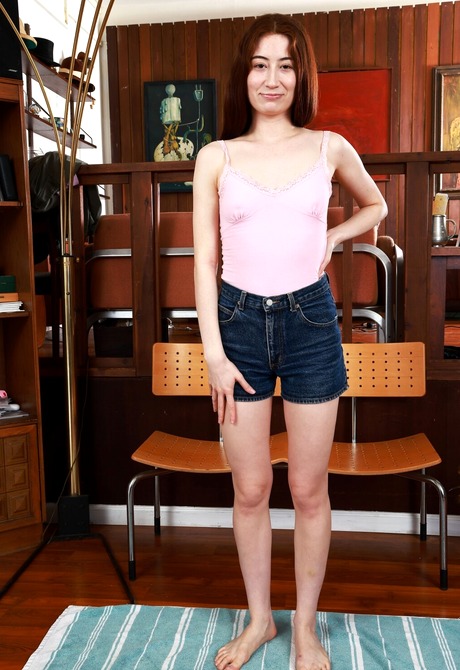 Redhead Ava Davis shows off closeup of perky nipples and skinny figure in different poses - 4 of 16