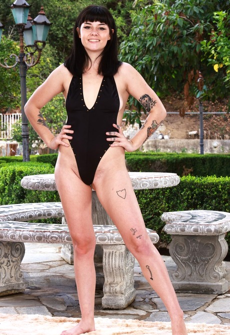 Alluring amateur Nova Vixen undressing and sharing small tits outdoors - 2 of 16