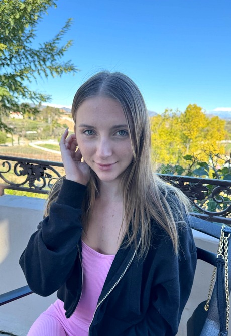 Teen Macy Meadows removes onesie to show tattoos along with nice ass and pussy - 2 of 16