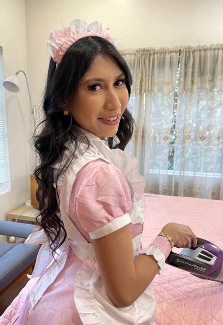 Latina babe Penelope Woods stripping off maid uniform in bedroom - 2 of 16