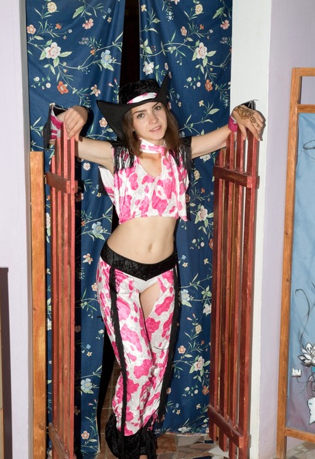 Petite teen babe Koko teasing in uniform and undressing
