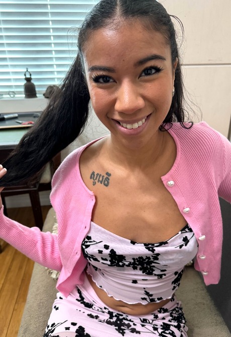 Exotic teen Ameena Green looking cute as she spreads shaved pussy on bed - 2 of 16