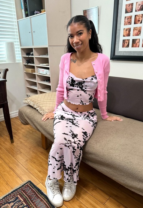 Exotic teen Ameena Green looking cute as she spreads shaved pussy on bed