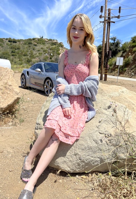 Cute blonde Sage Fox flashing pussy in upskirt shots outdoors - 4 of 16