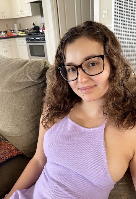 Cute amateur teen Leana Lovings undressing and showing juicy booty on couch - 3 of 16